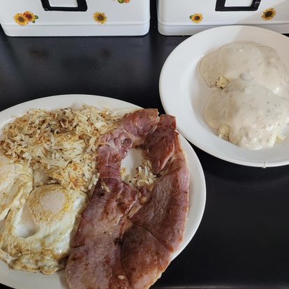 Country ham, eggs, hash browns, biscuits and gravy from Angie’s Kitchen